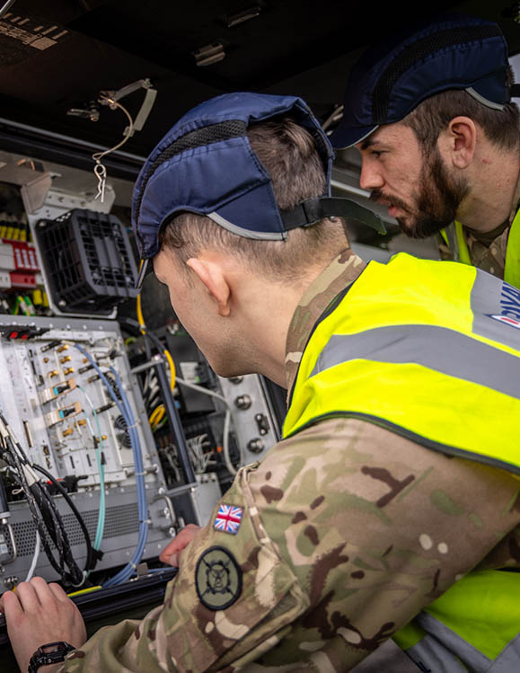 An RAF Apprenticeships checks a screen.