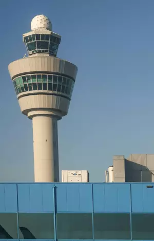 Air traffic control tower with blue sky