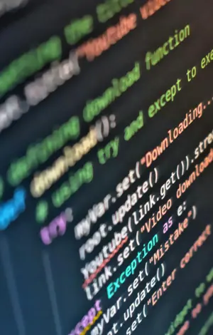 A close up of a computer screen showing lots of coding