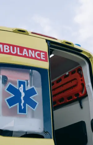 A close up of the back of an ambulance van with the door open
